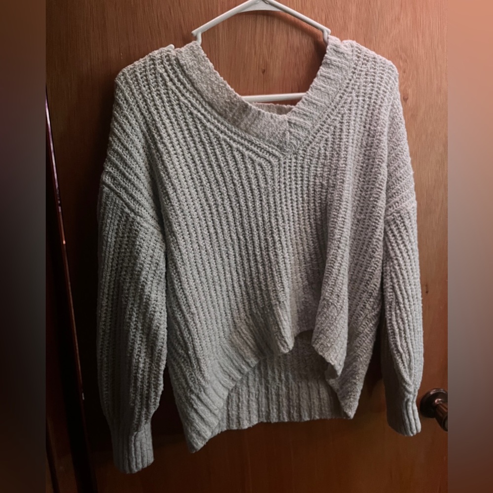 white colored sweater